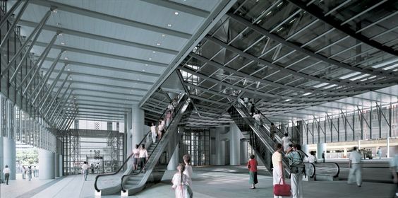 Interior do Shangai Bank HQ, com amplo espaço livre e duas escadas rolantes ao centro.
